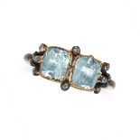 AN ANTIQUE GEORGIAN AQUAMARINE AND DIAMOND RING in yellow gold and silver, set with two cushion c...