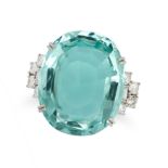 AN AQUAMARINE AND DIAMOND RING in platinum, set with an oval cut aquamarine of 31.73 carats, the ...