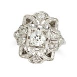 A DIAMOND DRESS RING in platinum, the geometric openwork face set with an old European cut diamon...