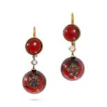 A PAIR OF GARNET, RUBY AND DIAMOND DROP EARRINGS in yellow gold, each set with a round cabochon g...