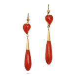 A PAIR OF ANTIQUE CORAL DROP EARRINGS in yellow gold, each set with a carved coral witches heart ...