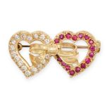 A VINTAGE RUBY AND DIAMOND SWEETHEART BROOCH in 18ct yellow gold, designed as two hearts set with...