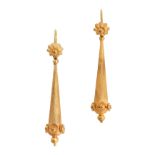 A PAIR OF ANTIQUE GOLD DROP EARRINGS in high carat yellow gold, each comprising a foliate top sus...