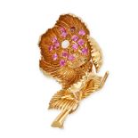 A VINTAGE RUBY AND DIAMOND FLOWER BROOCH in 18ct yellow gold, designed as an articulated flower, ...