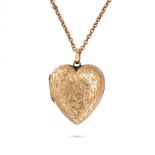 AN ANTIQUE EDWARDIAN HEART LOCKET PENDANT AND CHAIN in 9ct yellow gold, the hinged heart shaped l...