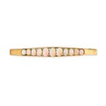 AN ANTIQUE OPAL BAR BROOCH in 9ct yellow gold, set with a row of eleven oval cabochon opals, stam...