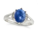 A SAPPHIRE AND DIAMOND RING in 9ct white gold, set with a cabochon sapphire of approximately 3.57...