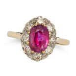 A RUBY AND DIAMOND CLUSTER RING in yellow gold, set with an oval cut ruby of approximately 1.72 c...