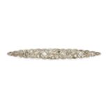 A DIAMOND BAR BROOCH in yellow gold and platinum, set with old mine cut diamonds and rose cut dia...