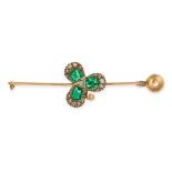 AN ANTIQUE VICTORIAN EMERALD AND DIAMOND CLOVER BAR BROOCH in yellow gold, designed as a three le...