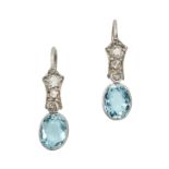 A PAIR OF AQUAMARINE AND DIAMOND DROP EARRINGS in 18ct white gold, set with oval cut aquamarines ...