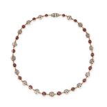 A GARNET, RUBY AND DIAMOND NECKLACE in yellow gold and silver, comprising a row of alternating ga...