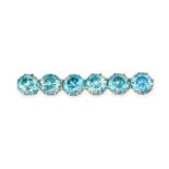 AN ART DECO BLUE ZIRCON BAR BROOCH, EARLY 20TH CENTURY set with six round cut blue zircons, no as...