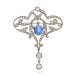 AN ANTIQUE EDWARDIAN SAPPHIRE AND DIAMOND PENDANT / BROOCH in platinum, set with a pear cut sapph...