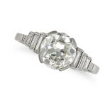 AN ANTIQUE ART DECO SOLITAIRE DIAMOND RING in platinum, set with an old cut diamond of 2.11 carat...