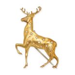 VAN CLEEF & ARPELS, A DIAMOND STAG BROOCH in yellow gold, designed as a stag accented by single c...