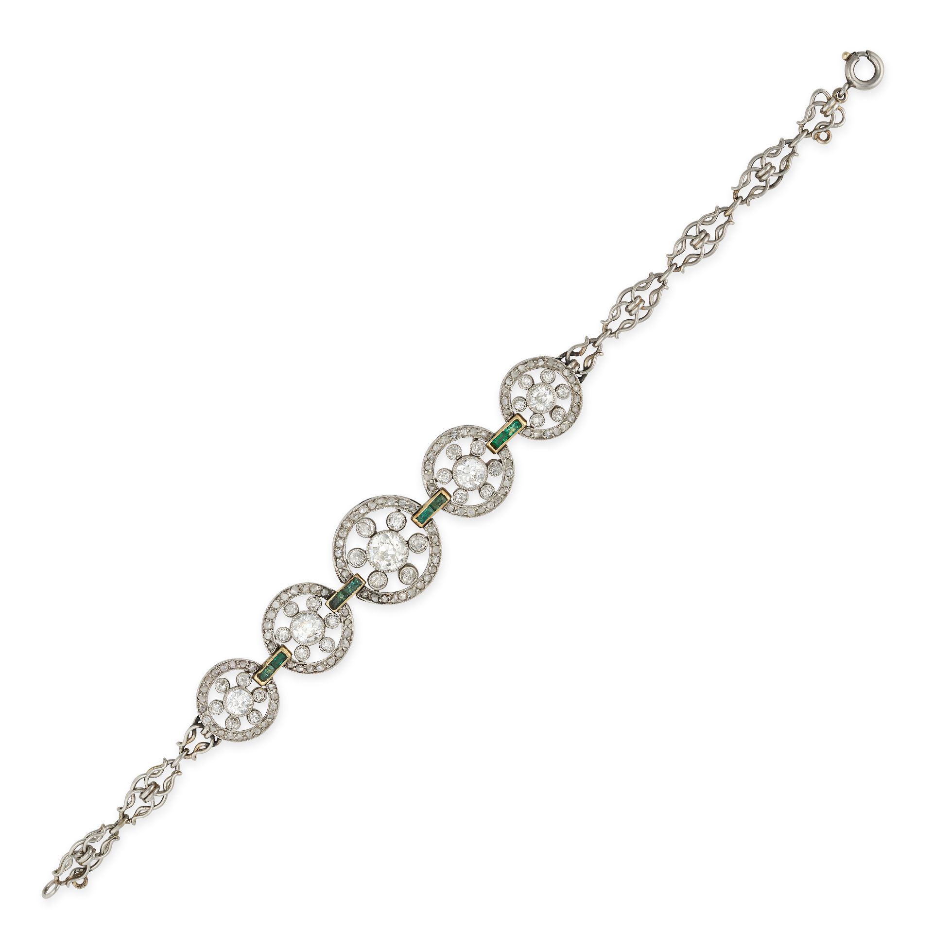 AN ANTIQUE ART DECO DIAMOND AND EMERALD BRACELET in platinum and yellow gold, the fancy link brac...