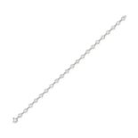 ELSA PERETTI FOR TIFFANY & CO., A DIAMONDS BY THE YARD DIAMOND BRACELET in platinum, comprising a...