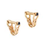 CARTIER, A PAIR OF SAPPHIRE STIRRUP CUFFLINKS in 18ct yellow gold, each designed as a stirrup set...