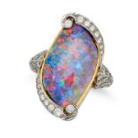 A FINE BLACK OPAL AND DIAMOND DRESS RING in platinum and yellow gold, set with a cabochon black o...