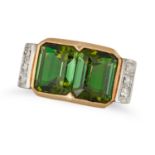 A RETRO GREEN TOURMALINE AND DIAMOND RING in yellow and white gold, set with two octagonal step c...