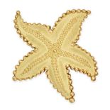 TIFFANY & CO., A VINTAGE STARFISH BROOCH in 18ct yellow gold, designed as a textured starfish acc...