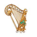 AN ANTIQUE EMERALD AND PEARL HARP BROOCH in yellow gold, designed as a harp set with cushion cut ...