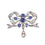 AN ANTIQUE  SAPPHIRE AND DIAMOND BOW BROOCH in yellow gold and silver, designed as a bow set with...