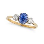 A SAPPHIRE AND DIAMOND THREE STONE RING in 18ct yellow gold, set with an oval cut sapphire of app...