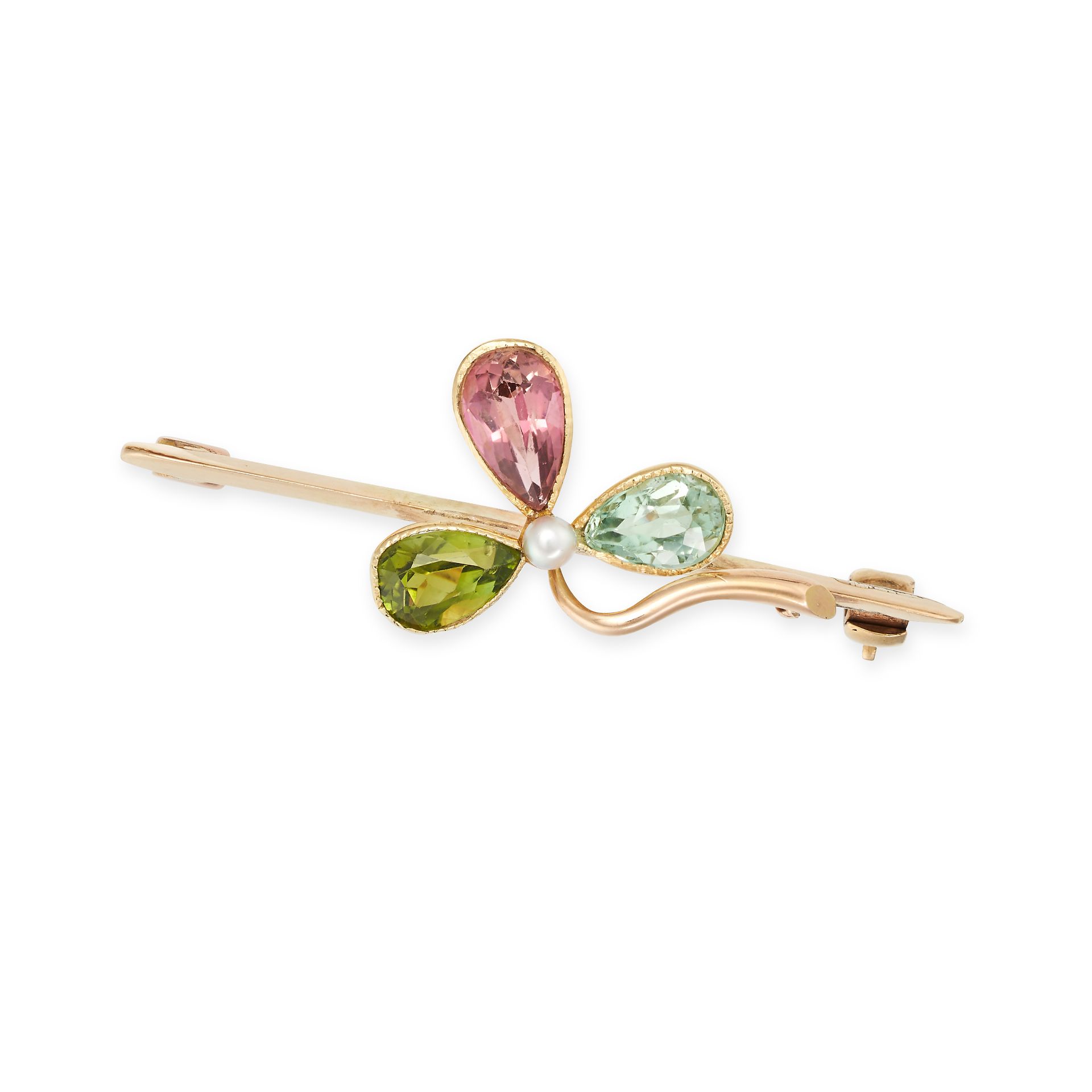 AN ANTIQUE MULTIGEM CLOVER BROOCH in 15ct yellow gold, designed as a three leaf clover set with a...