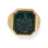 AN ANTIQUE BLOODSTONE INTAGLIO SIGNET RING in yellow gold, set with an octagonal bloodstone intag...
