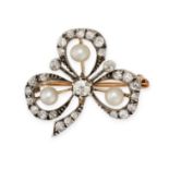 AN ANTIQUE DIAMOND AND PEARL CLOVER BROOCH in yellow gold and silver, designed as a three leaf cl...