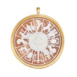 A SHELL CAMEO ZODIAC CALENDAR BROOCH / PENDANT in yellow gold, the shell cameo carved to depict t...