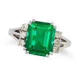 A SYNTHETIC EMERALD AND DIAMOND RING in white gold, set with an octagonal step cut synthetic emer...