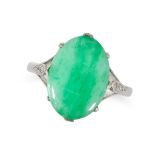 A JADEITE JADE AND DIAMOND RING in platinum and 18ct white gold, set with an oval cabochon jadeit...