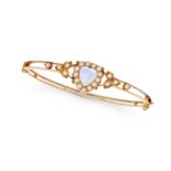 AN ANTIQUE MOONSTONE AND PEARL BANGLE in yellow gold, the hinged bangle set with a heart shaped c...