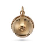 AN ANTIQUE MASONIC PUZZLE BALL in yellow gold and silver, the spherical body opening to reveal a ...