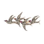 AN ANTIQUE RUBY AND DIAMOND SWALLOW BROOCH in yellow gold and silver, designed as a group of four...