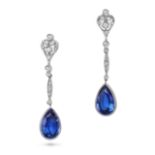 A PAIR OF DIAMOND AND TANZANITE DROP EARRINGS in platinum, each comprising a row of links set wit...