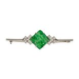 A JADEITE JADE AND DIAMOND BAR BROOCH in 18ct white gold and platinum, set with a carved square o...