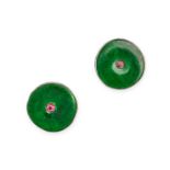 A PAIR OF JADEITE JADE AND RUBY EARRINGS each comprising a polished jadeite jade disc set with a ...