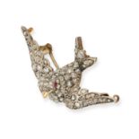 AN ANTIQUE RUBY AND DIAMOND SWALLOW BROOCH in yellow gold and silver, designed as a three dimensi...