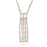 A PEARL TASSEL NECKLACE comprising a trace chain set with pearls, suspending a fringe of further ...