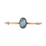 AN OPAL BAR BROOCH in yellow gold, set with an oval cabochon opal, no assay marks, 4.7cm, 3.4g.