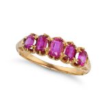 A RUBY FIVE STONE RING in yellow gold, set with a row of five graduated cushion cut rubies, no as...