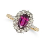 A VINTAGE UNHEATED RUBY AND DIAMOND CLUSTER RING in 18ct yellow gold, set with an oval cut ruby o...