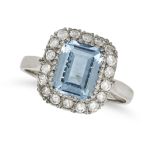 AN AQUAMARINE AND DIAMOND CLUSTER RING in 18ct white gold, set with an octagonal step cut aquamar...