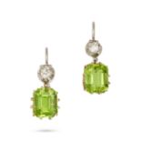 A PAIR OF PERIDOT AND DIAMOND DROP EARRINGS in yellow and white gold, each set with an old cut di...