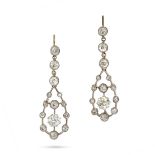 A PAIR OF ANTIQUE DIAMOND DROP EARRINGS in yellow gold, each comprising a row of old cut diamonds...
