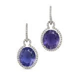 A PAIR OF IOLITE AND DIAMOND DROP EARRINGS in 18ct white gold, each comprising a half hoop set wi...